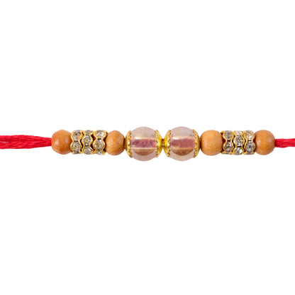 Red Thread Rakhi with Wooden Bead and Dusty-Pink Crystal Accents