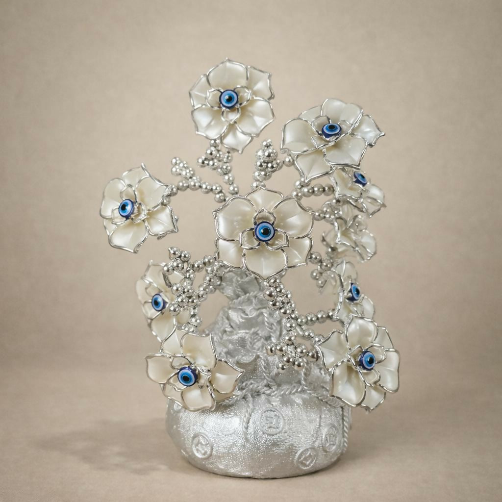 Elegant silver table décor with flower tree and evil eye design for home or office