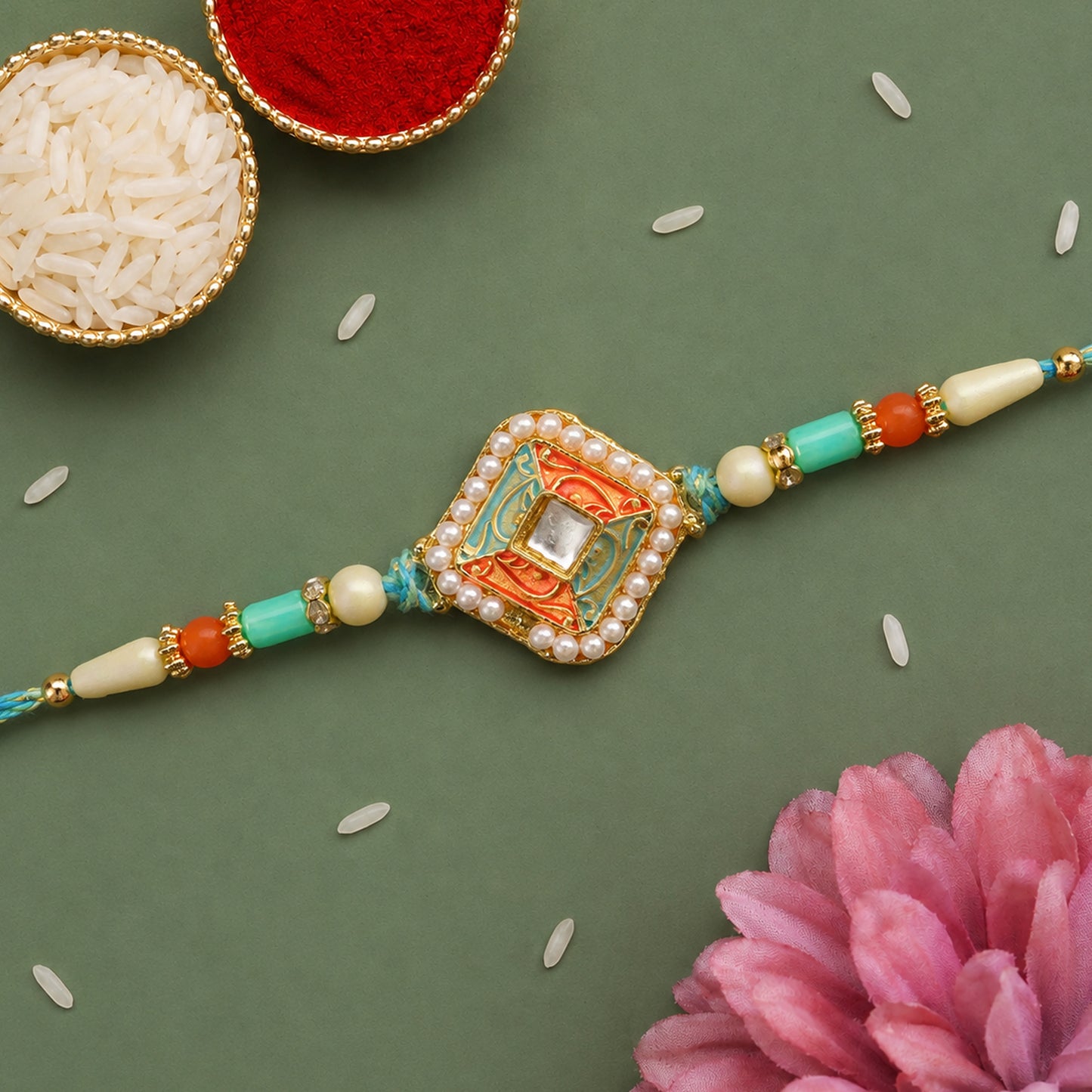Pearl Bordered Meenakari Pendant Rakhi with Orange and Teal Enamel
