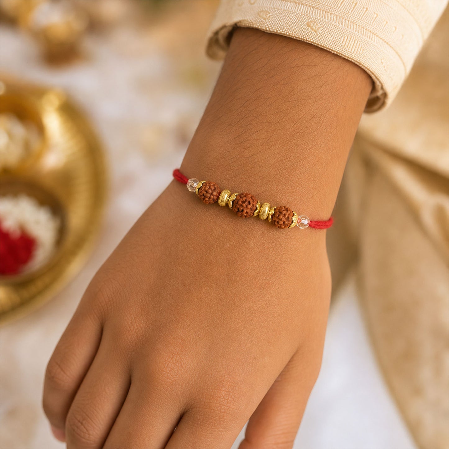 Red Thread Rakhi with Triple Natural Rudraksha Bead Pendant