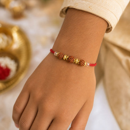 Red Thread Rakhi with Triple Natural Rudraksha Bead Pendant