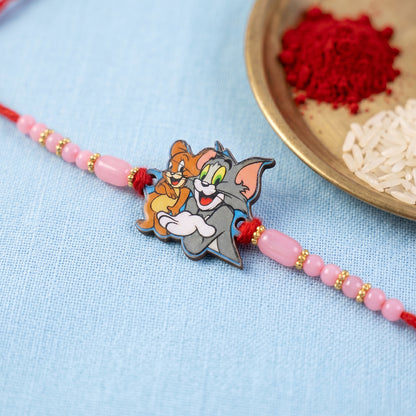 Cartoon Kids Rakhi with Pink Beads and Gold Accents