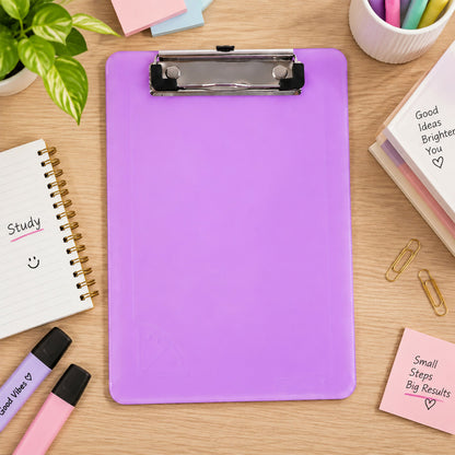 A vibrant purple plastic clipboard with a shiny metal clip rests on a wooden desk surrounded by office supplies.