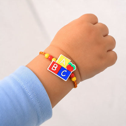 Kids Beaded Rakhi for Brother - Alphabet Blocks Cartoon Design (5pcs)