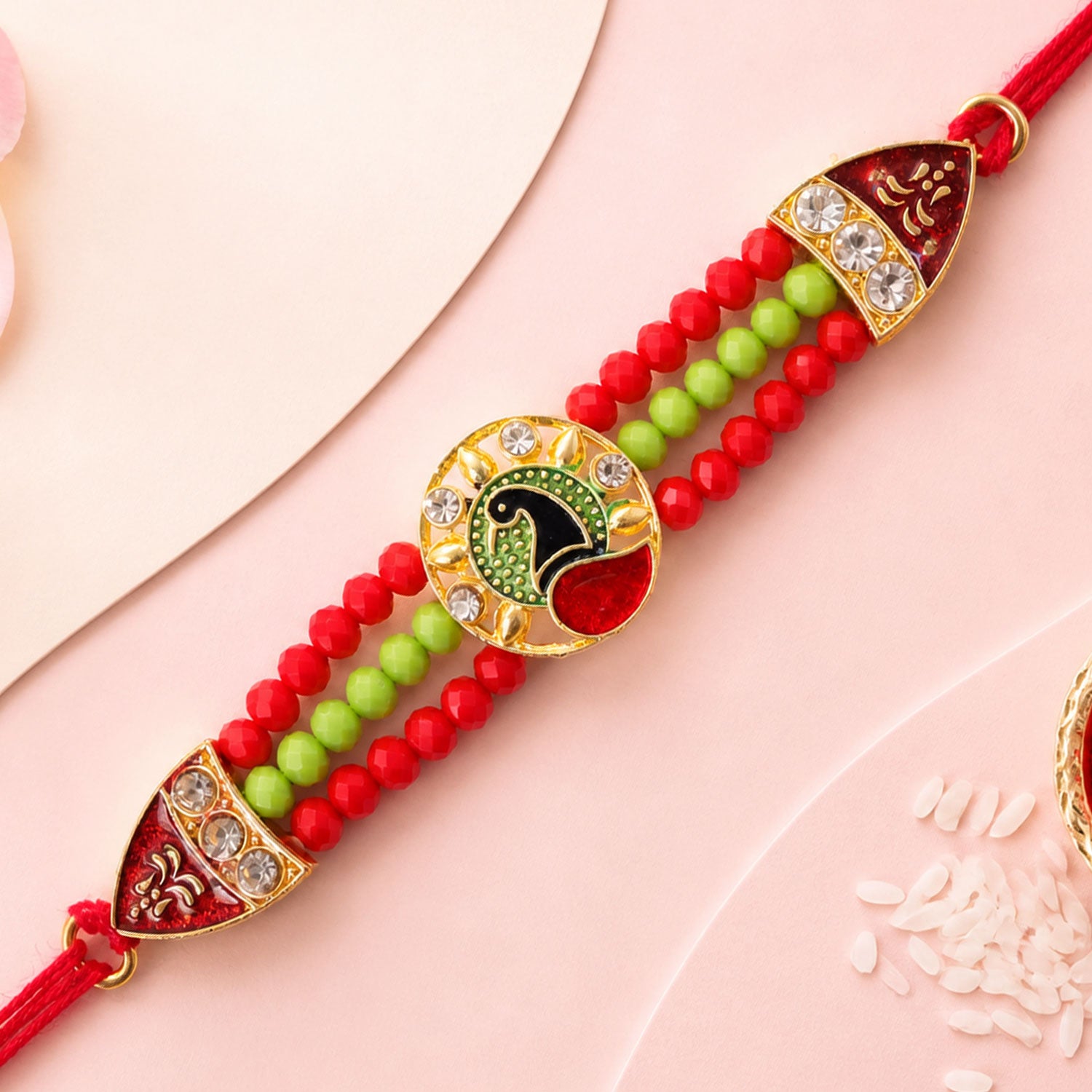 Red Green Beaded Rakhi with Gold Medallion and Bright Traditional Festive Gift Style