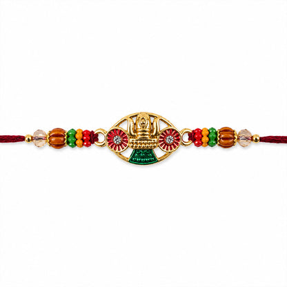 Golden Kalash Temple Devotional Rakhi with Red Green Details and Festive Beads