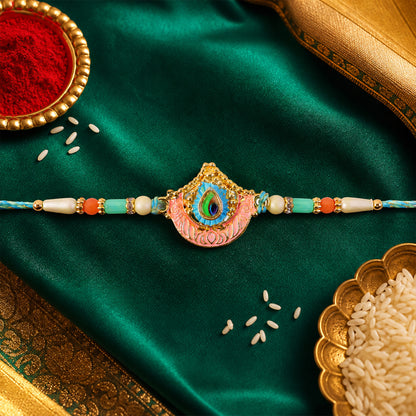 Peacock Feather Crown Pendant Rakhi with Pink Enamel