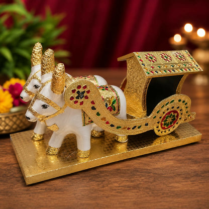 Side view of colorful Meenakari bullock cart with oxen figures