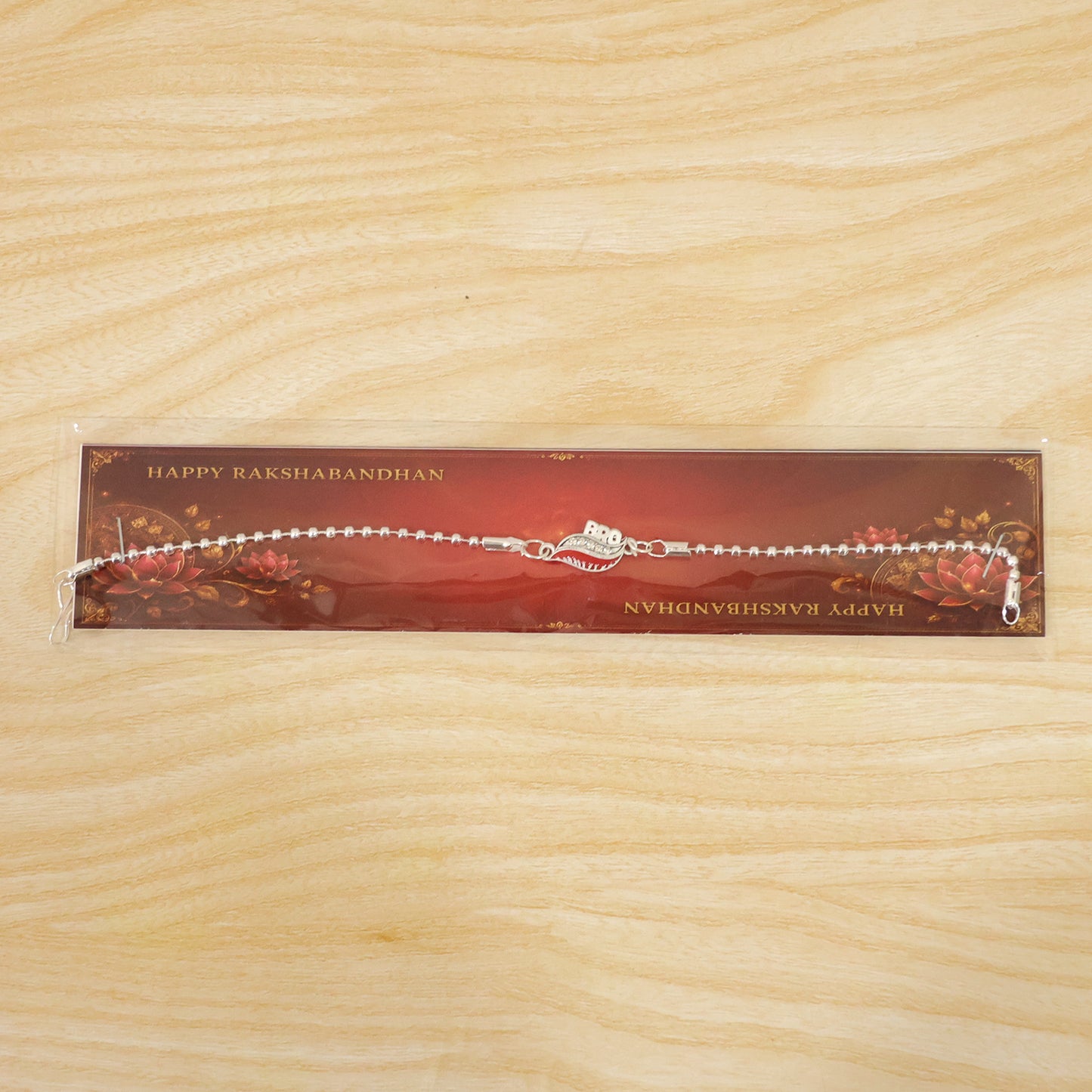 Bro Leaf Crystal Studded Enamel Silver Chain Designer Rakhi