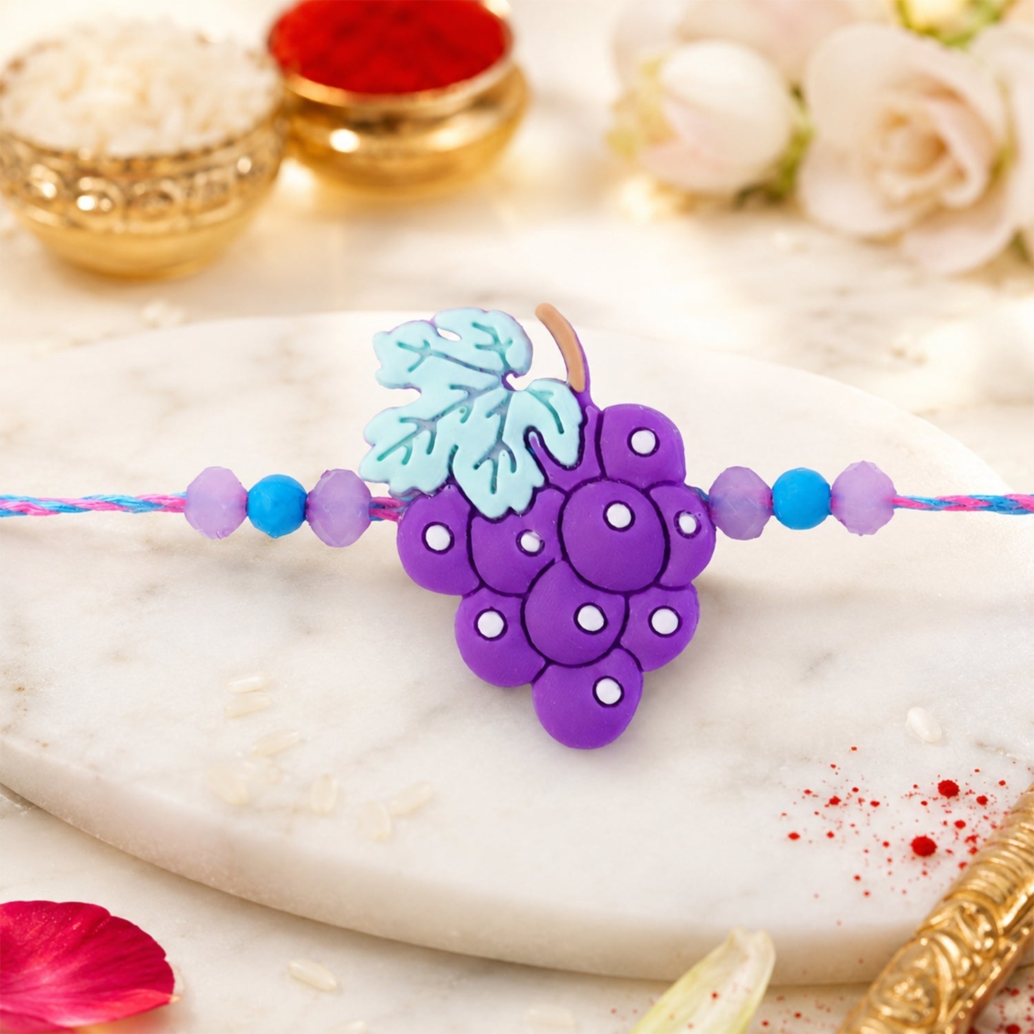 Shop Grape Bunch Charm Kids Beaded Designer Rakhi for Brother (10pcs)