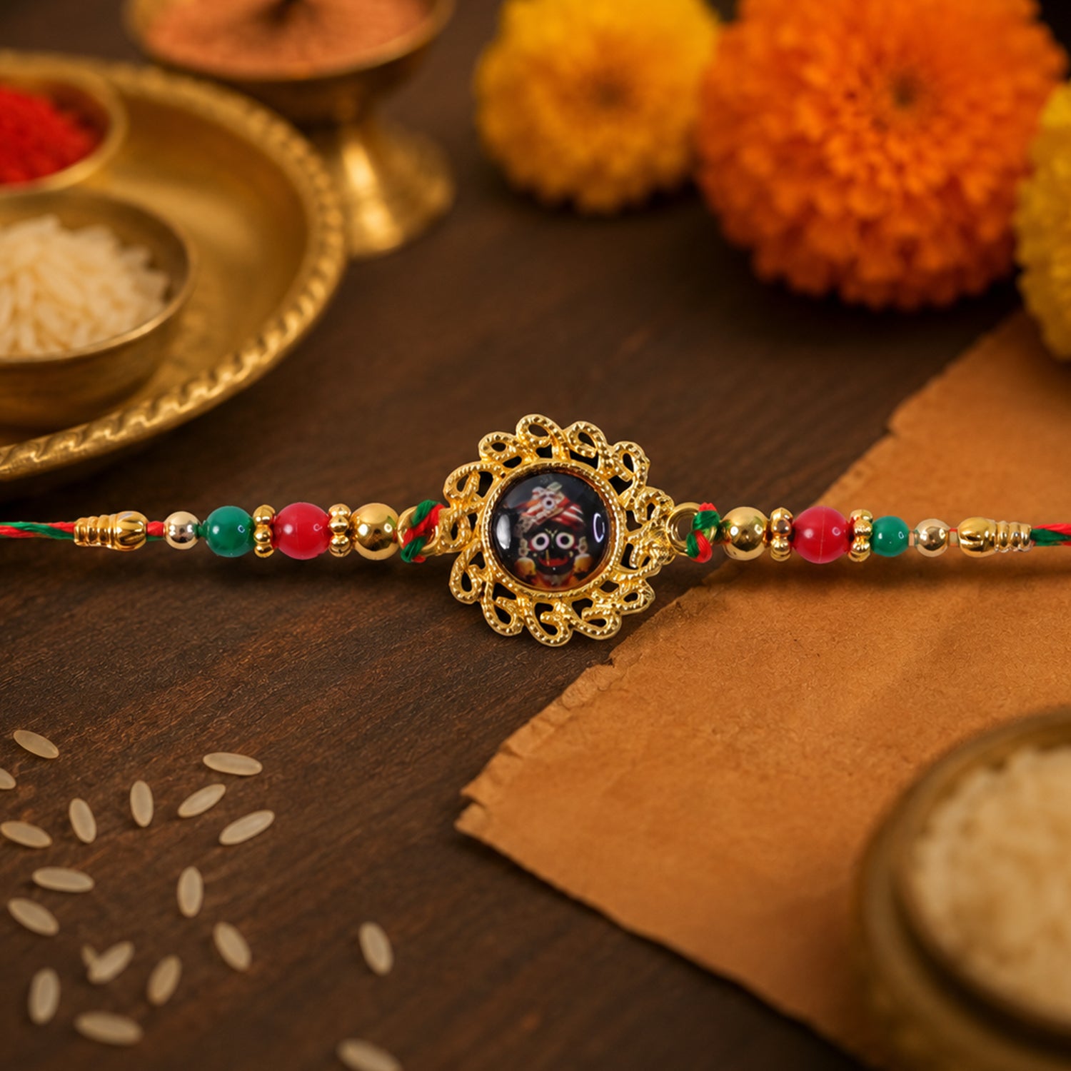 Lord Jagannath Pendant Rakhi with Red Beads