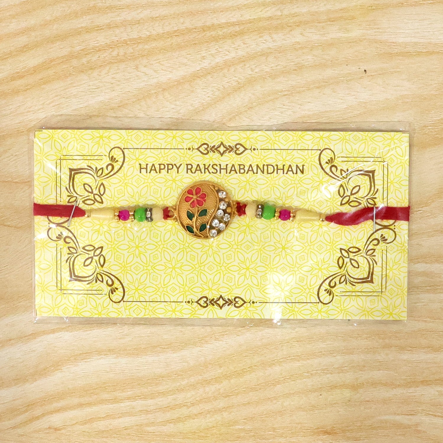 Flower Design Rakhi with Red and Green Beads Festive Elegance (5pcs)