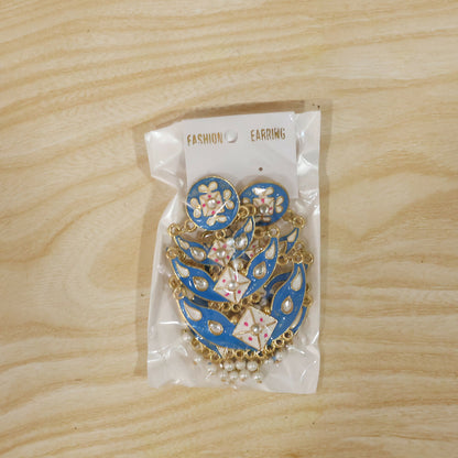 Model wearing royal blue layered pearl ethnic earrings