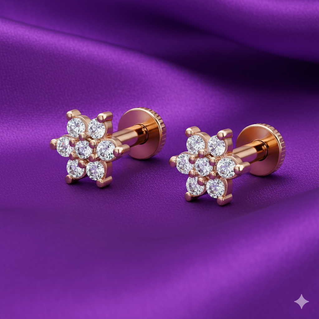 Rose gold plated flower stud earrings displayed on white background showcasing floral design