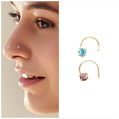Gold plated emerald green crystal nose pin showing detailed craftsmanship
