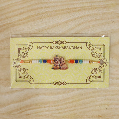 Decorative Rakhi featuring Radha Krishna motif for festival