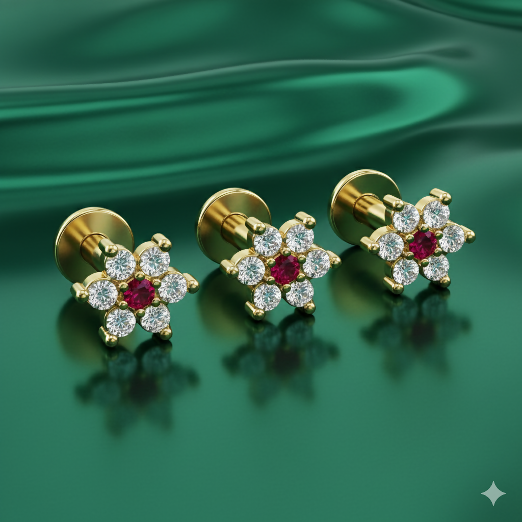 Close-up view of gold plated flower labret stud showing ruby center detail