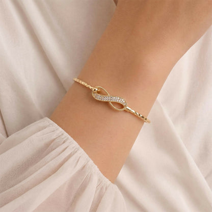 Openable gold kada bracelet showing clasp design