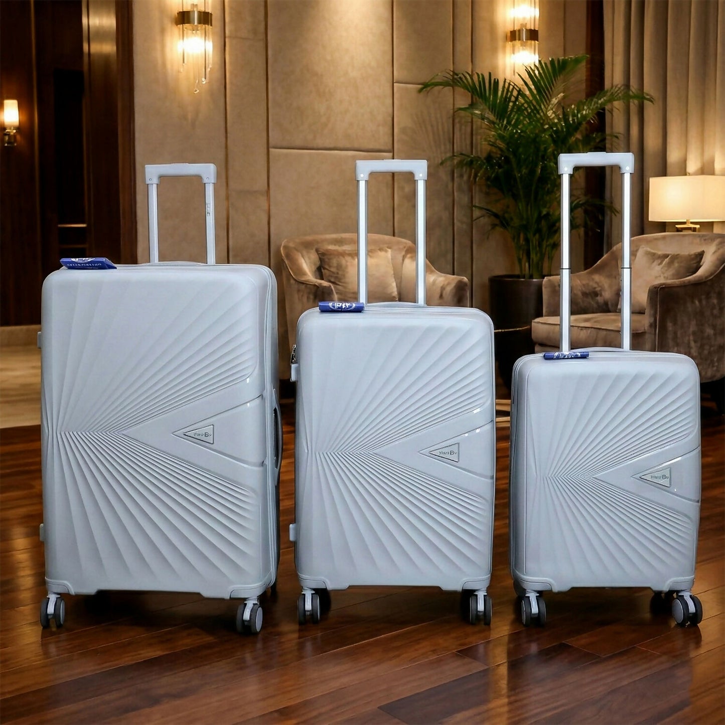 Grey travel luggage with lightweight, scratch-resistant hard shell and 8 spinner wheels