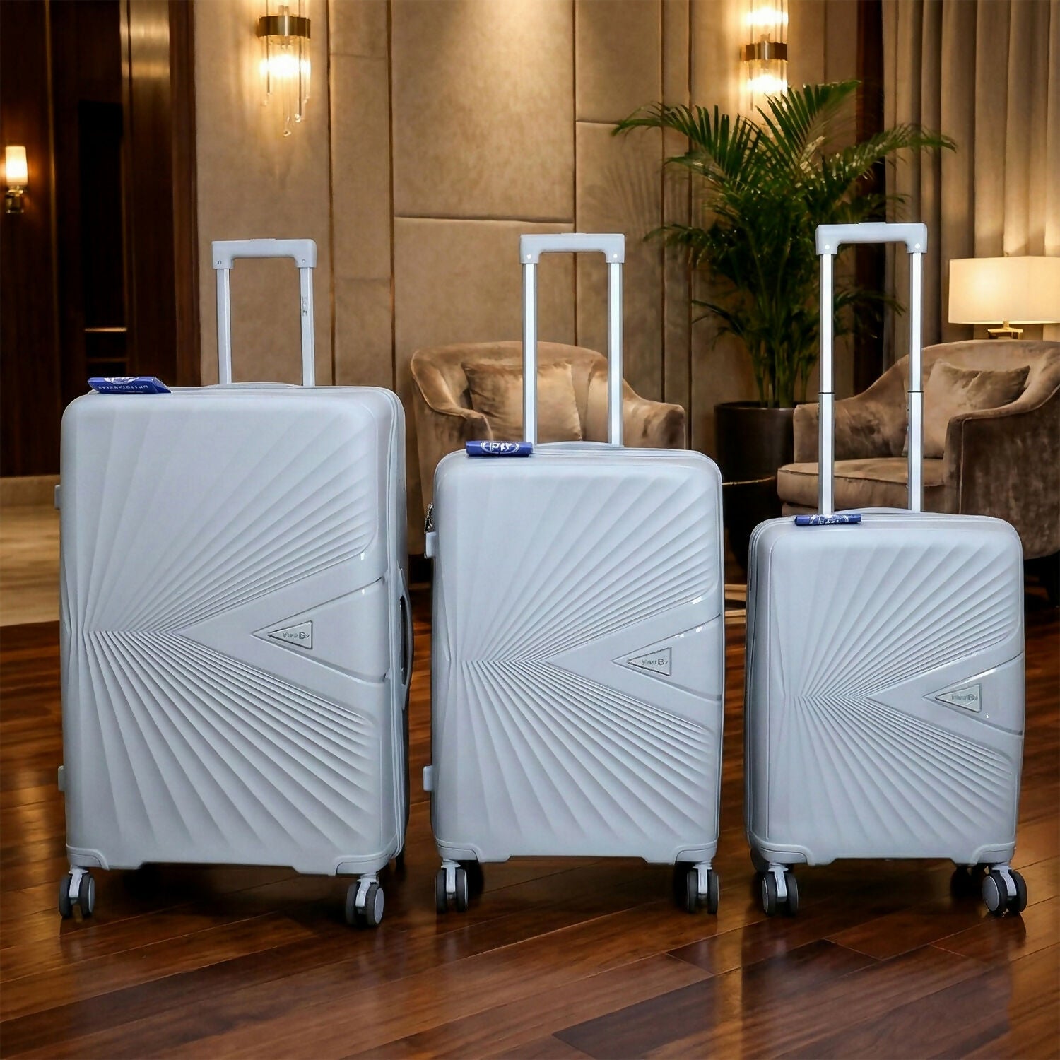 Grey travel luggage with lightweight, scratch-resistant hard shell and 8 spinner wheels
