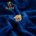 Geometric Starburst Statement Ring with Sparkling Stones & Detailed Gold-Tone Finish
