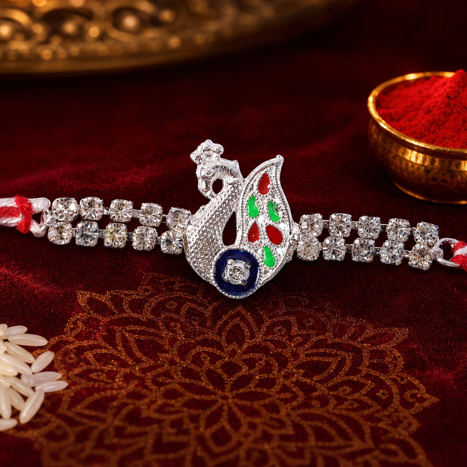 Silver-Toned Peacock Rakhi with Multicolor Enamel, Double Crystal Chain & Red Thread