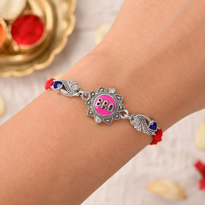Silver-Toned BRO Rakhi with Pink Enamel, Blue Heart Accents, Crystals & Red Thread