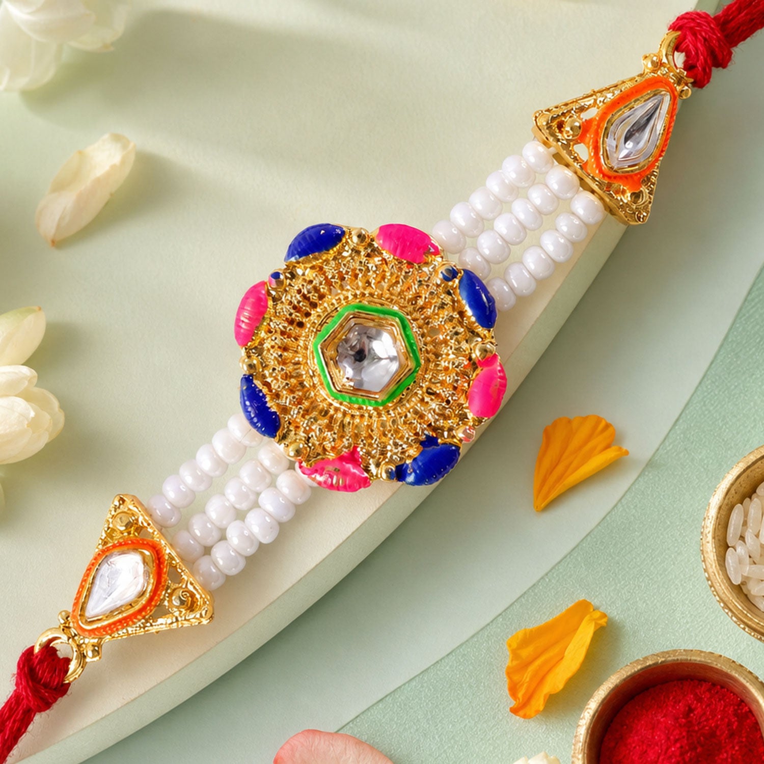 Round Filigree Kundan & Meenakari Centerpiece Rakhi with Triple Strand White Pearls