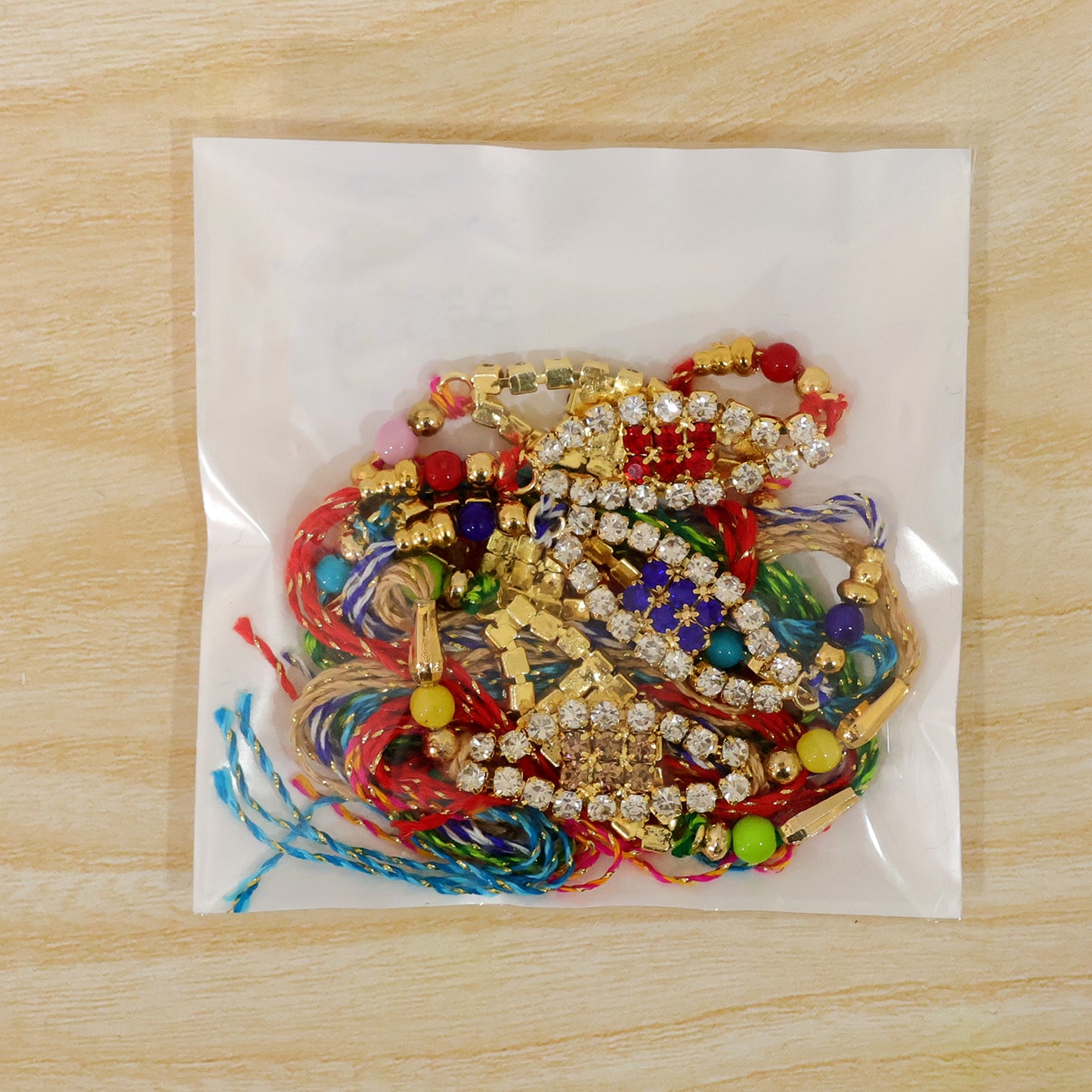 Open Oval Frame Rakhi with AD Stone Detailing (Pack of 6)