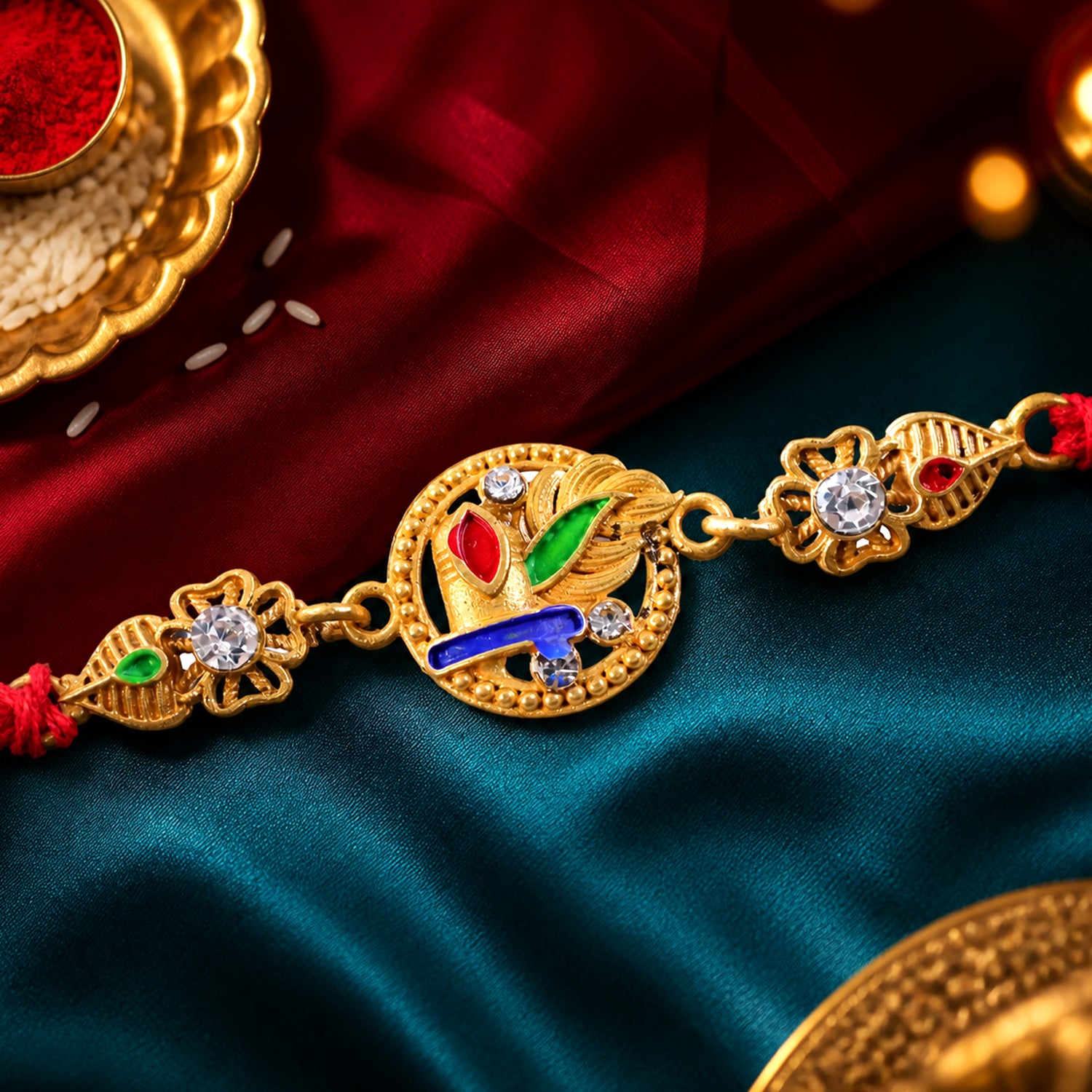 Ornate Rakhi featuring Oval Floral Charm, multicolor stones and chain look for Gift