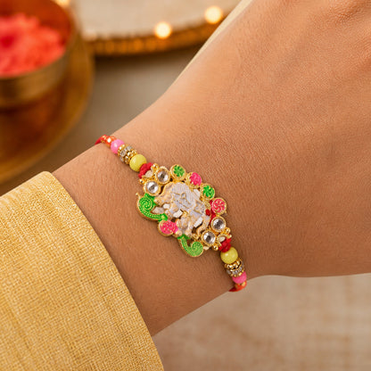 Festive Rakhi featuring Elephant Charm and gold trims in display look for Gift Use