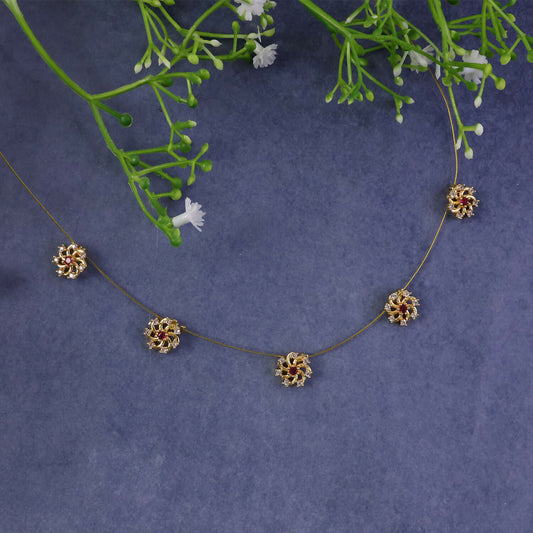Ruby Floral Station Necklace with Diamond Detailing and Elegant Gold Chain Design