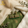 Jhumka Earrings – Traditional Gold-Plated Leaf Design with Green Bead