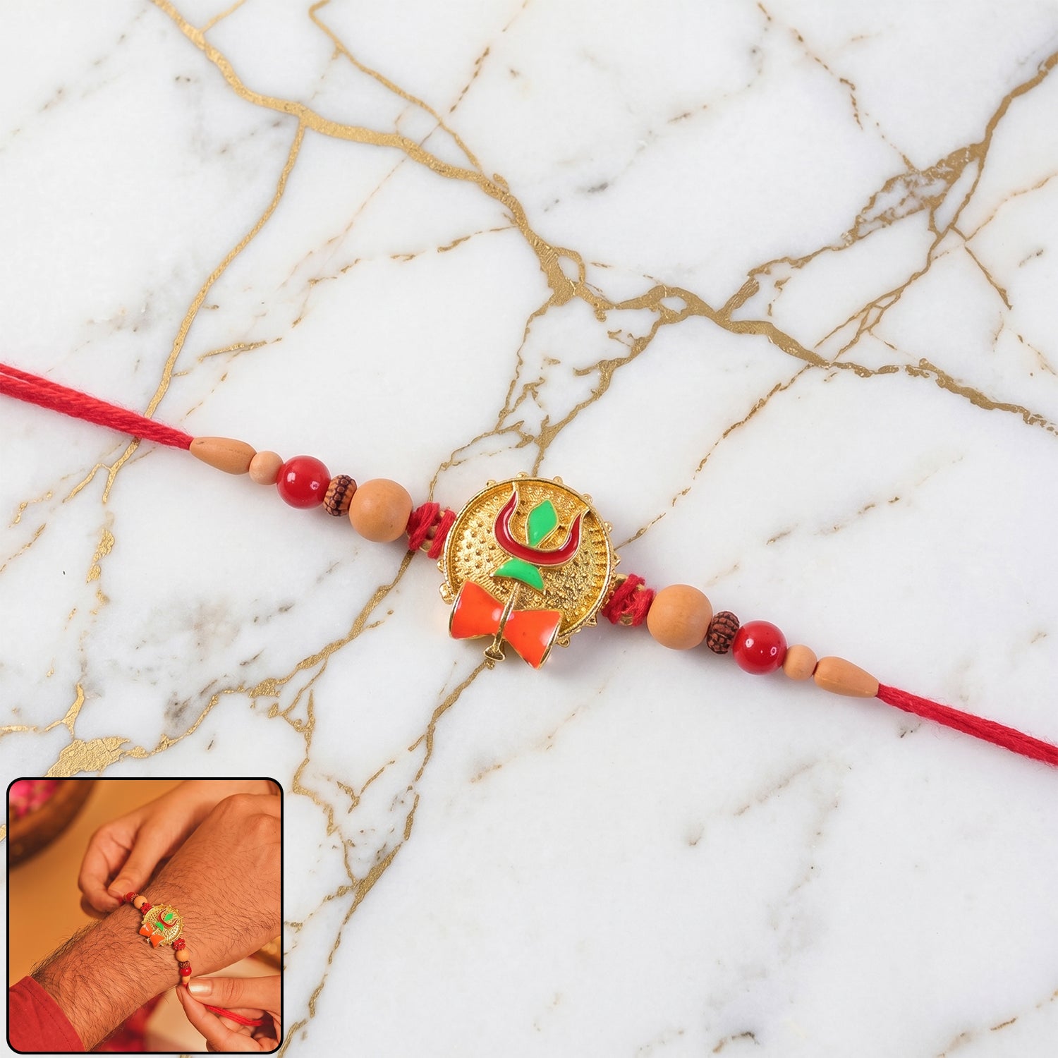 Trishul Damru Rakhi with Peach Beads and Red Thread