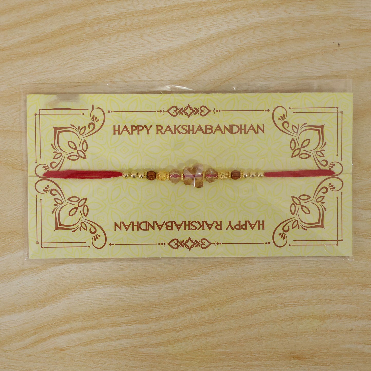 Crystal Flower Cluster Rakhi with Faceted Stones, Golden Accents and Red Thread