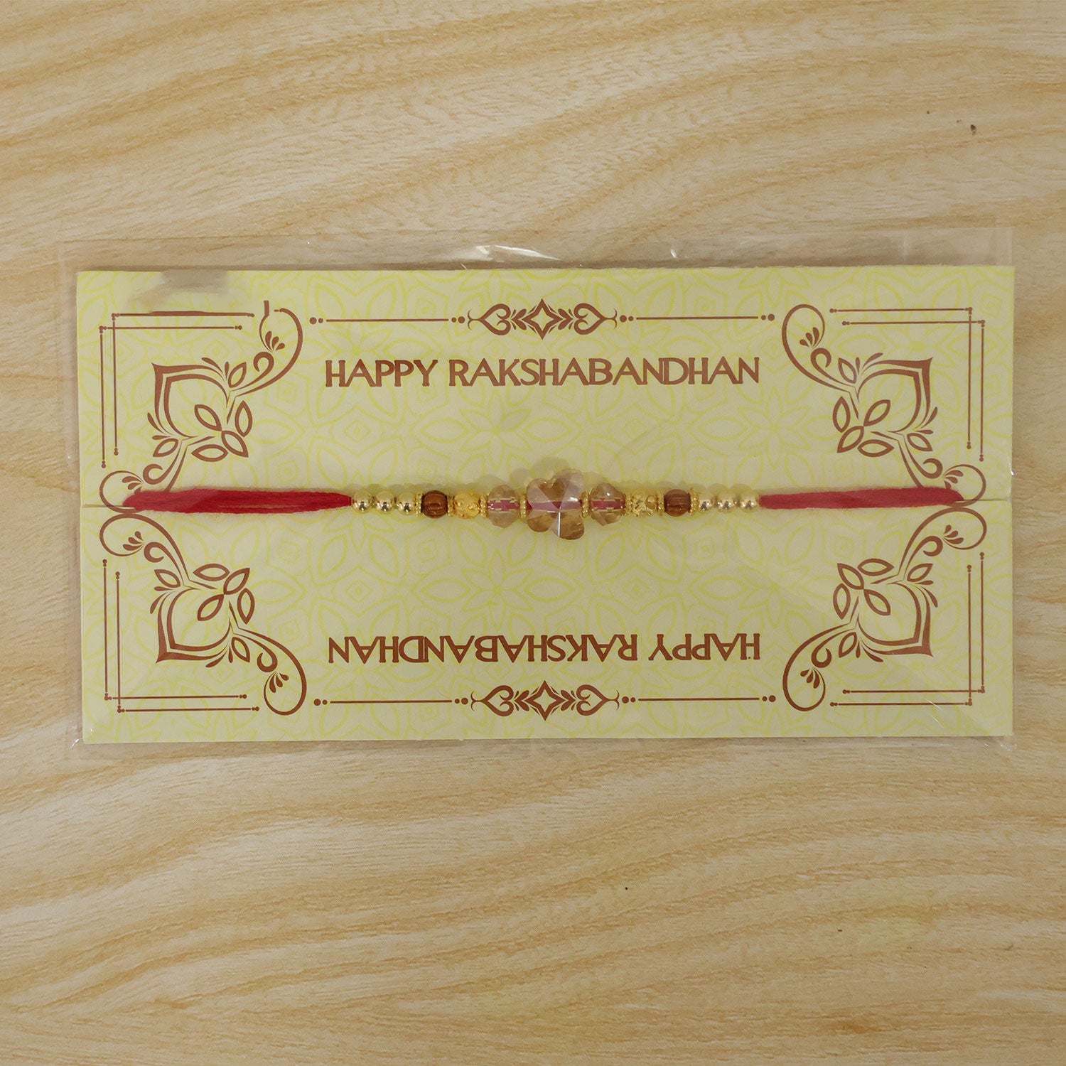 Crystal Flower Cluster Rakhi with Faceted Stones, Golden Accents and Red Thread