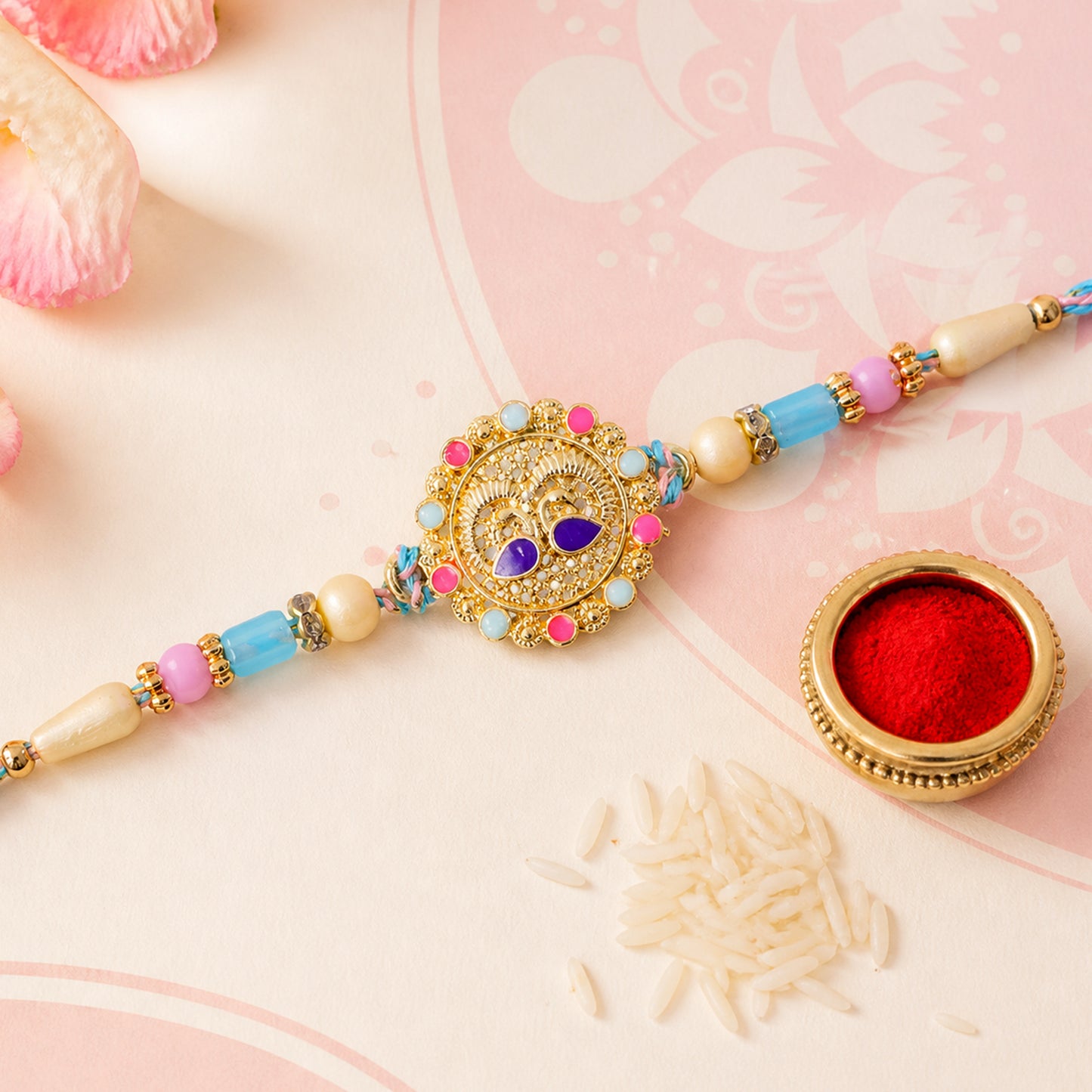 Gold Sunburst Kundan Pendant Rakhi with Pastel Beads