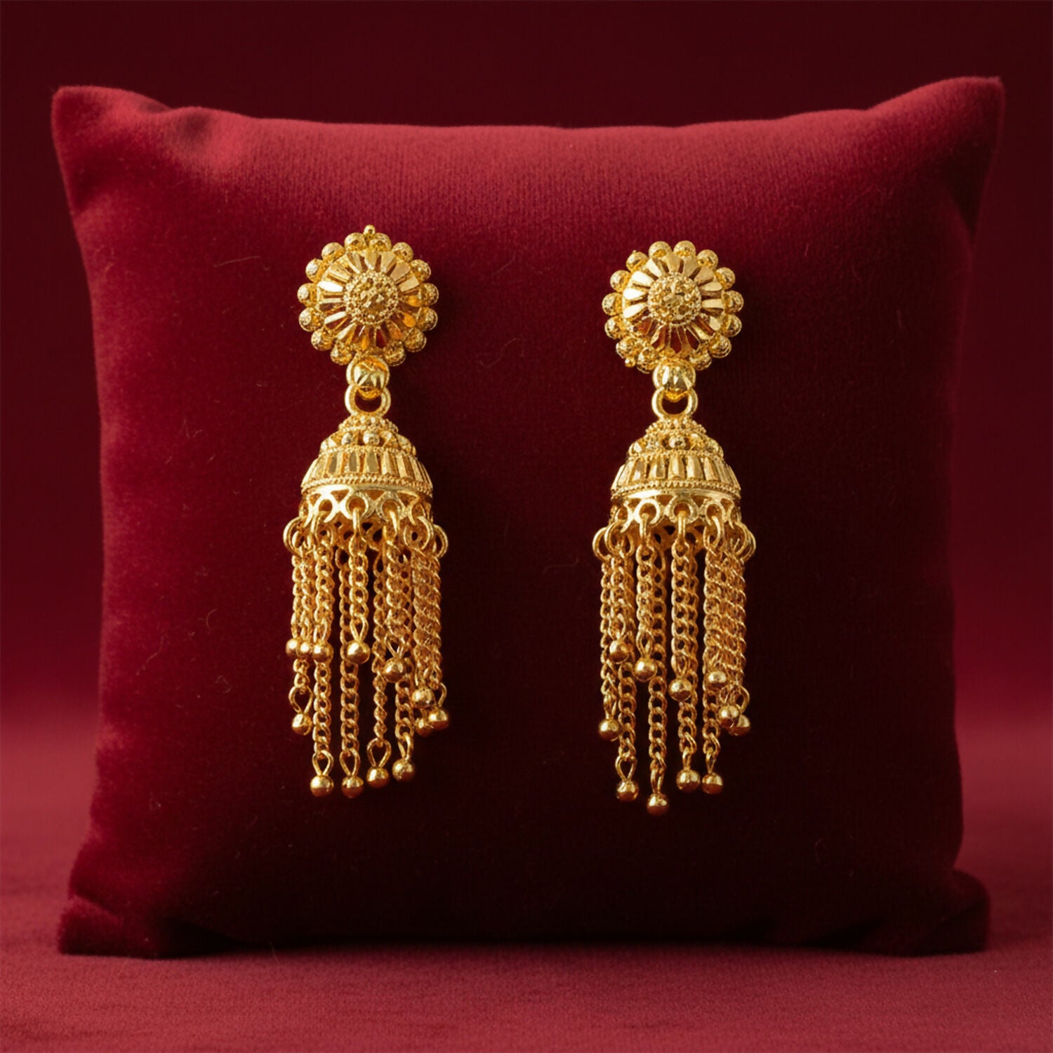 Gold plated long chain jhumka earrings with circular stud and hanging chains