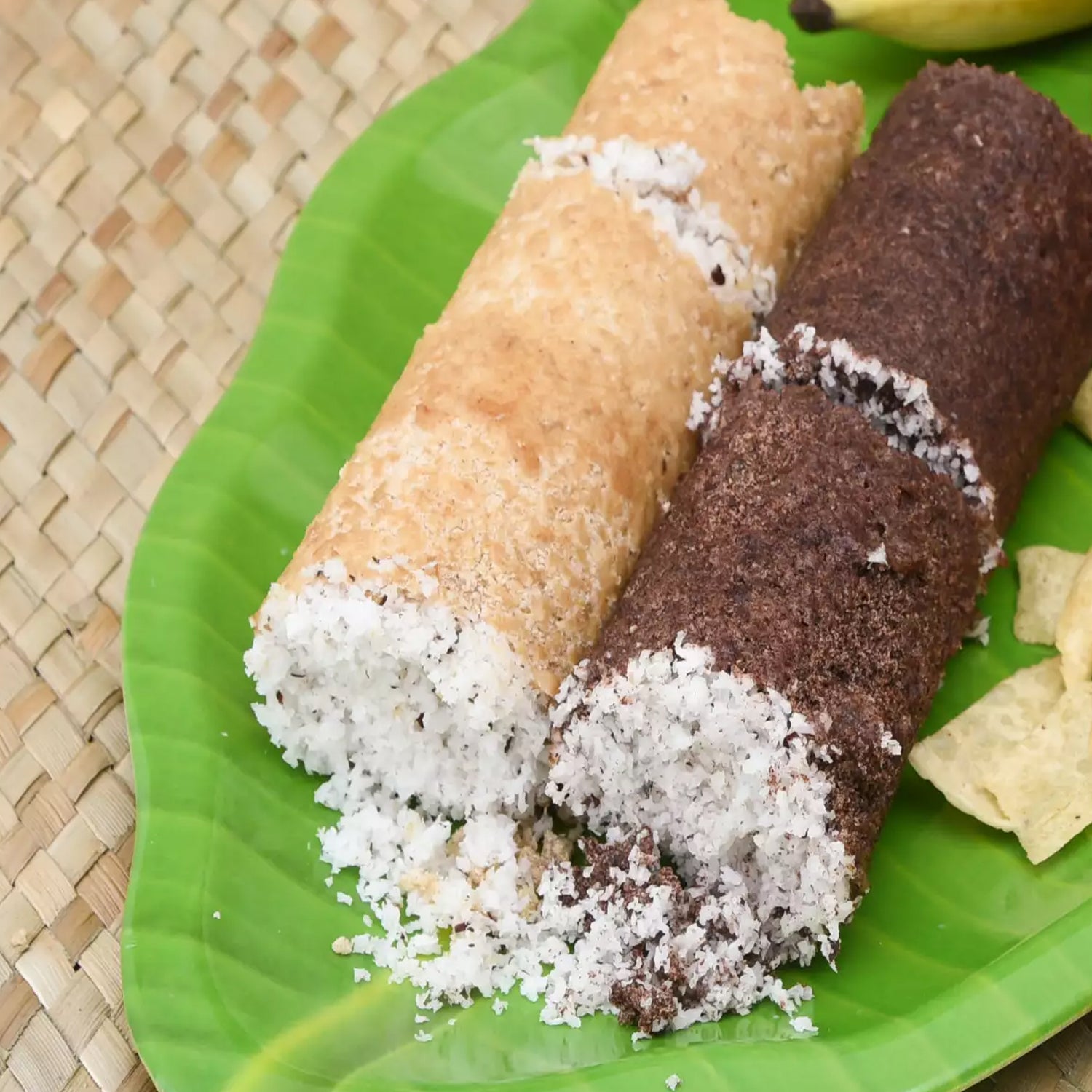 Black handle and metal steamer for making puttu