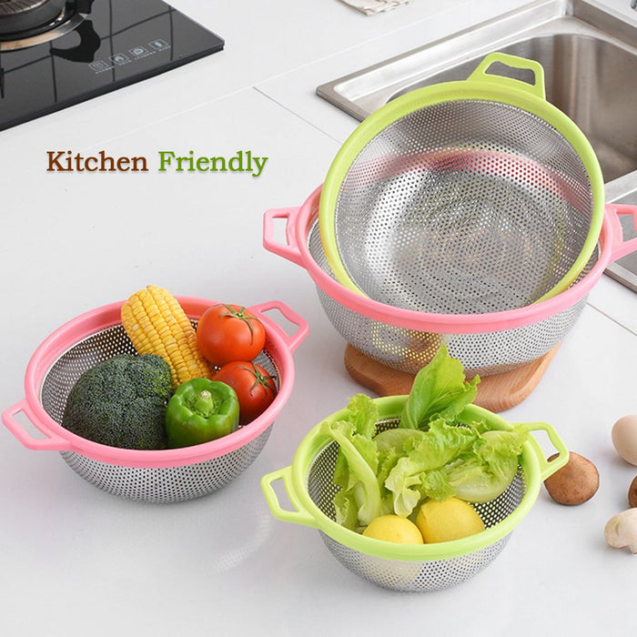 Colander with fruits in a kitchen setting