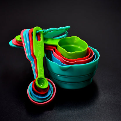 Measuring spoons and cups set in plastic for various kitchen tasks