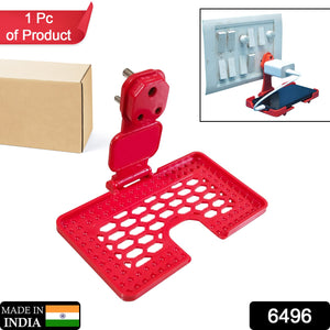 Mobile holder stand in red color.