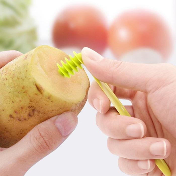 Kitchen spiral knife for slicing vegetables into stylish curly shapes for salads.