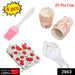 Kitchen tools set with spatula brush, oven glove, egg yolk separator, and paper cups.