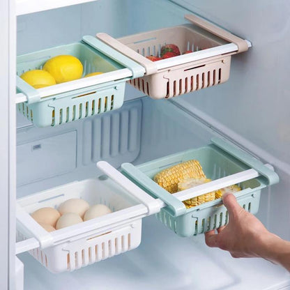 Adjustable fridge organizer drawers for storage.