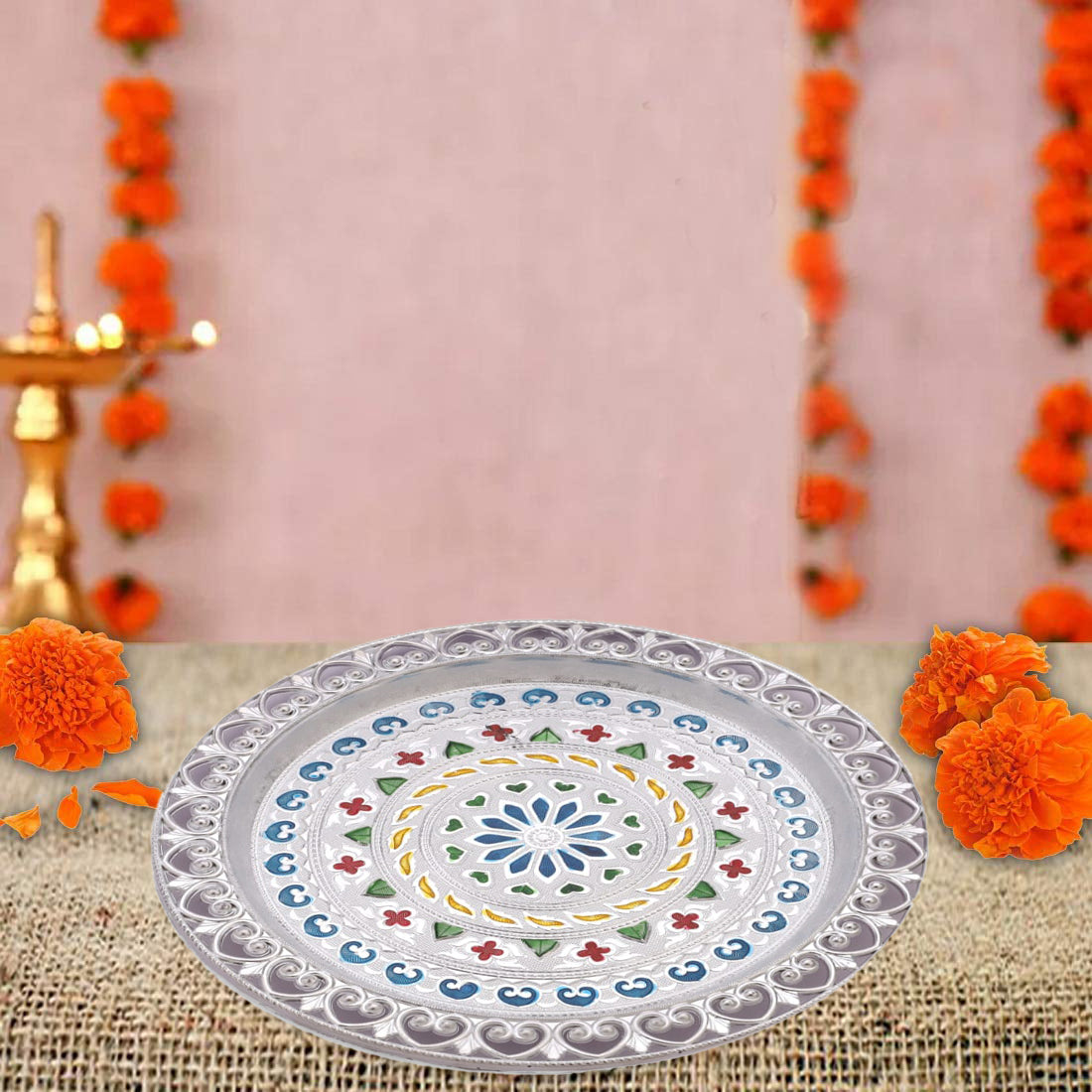 Detailed view of silver plated pooja thali.