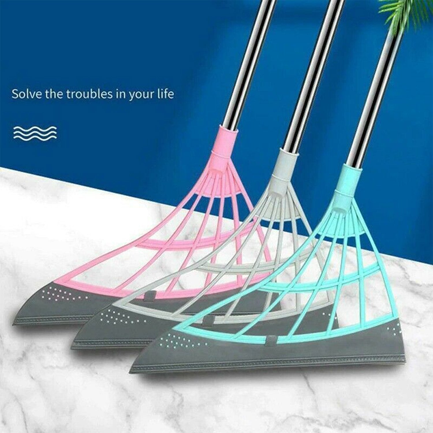 Eco-friendly broom with a scraper for easy cleaning