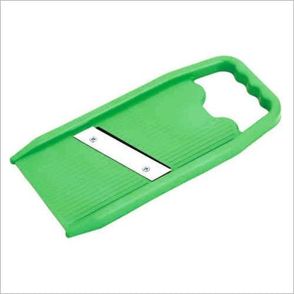 Plastic vegetable slicer for effortless cutting of fruits and vegetables.